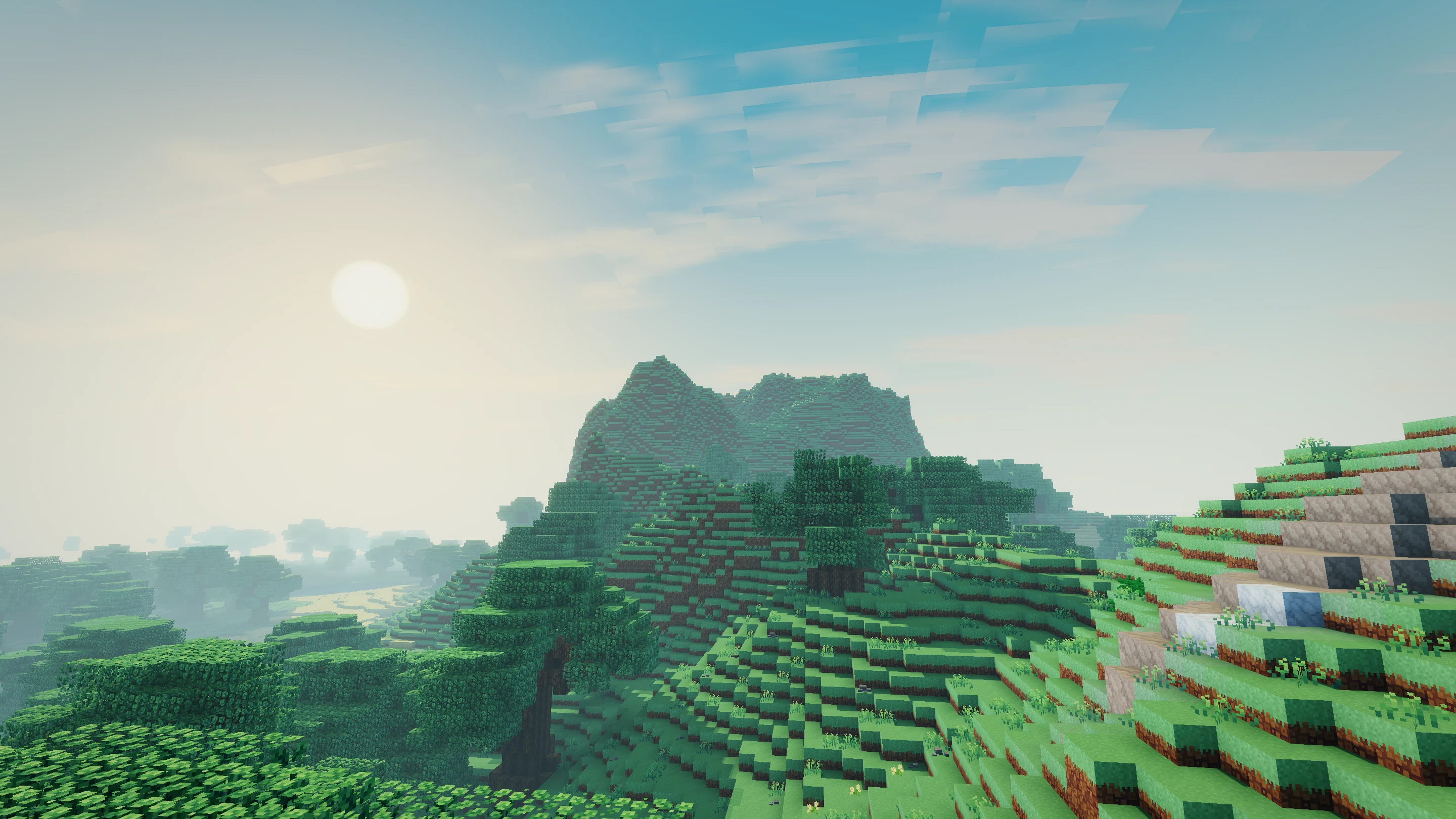 Green hills and a forested valley with room to make a home